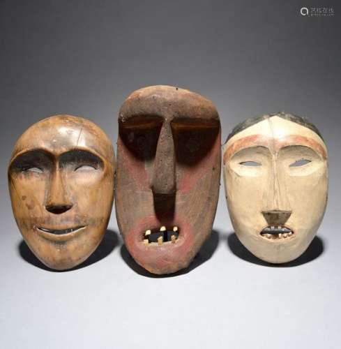 An Inuit mask Alaska with white, black and red pig…
