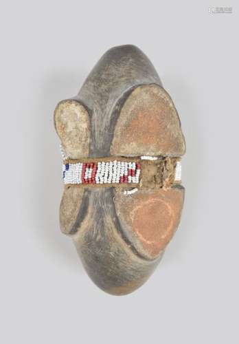 A Sioux club head Plains, North America stone with…