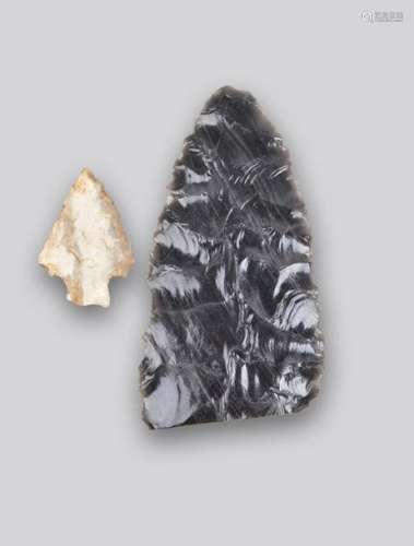 An American arrow head flint, 4cm long, mounted, a…