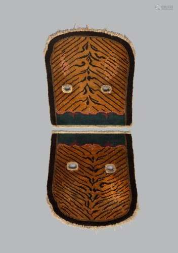 A Tibetan 'tiger' saddle cover in two parts with n…