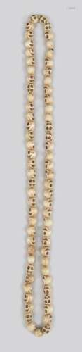 A Tibetan bead mala carved bone, of sixty nine hum…