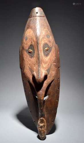An Iatmul mei mask Papua New Guinea with inset cow…