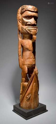 A Malagan figure New Ireland, Melanesia standing i…