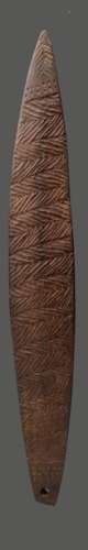 An Aboriginal bullroarer Australia with carved lin…