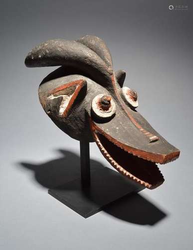 A Mambila mask Cameroon with resin and seeds to th…