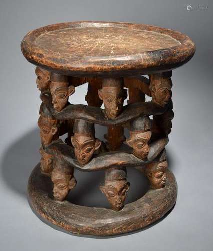 A Bamileke large stool Cameroon with three rows of…