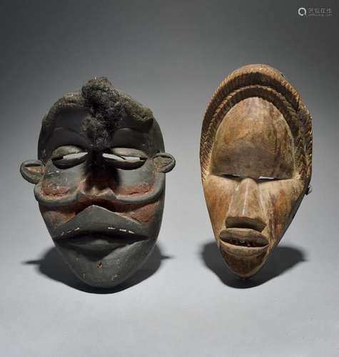 A Guere mask Ivory Coast with an applied fibre coi…