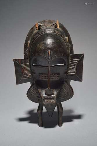 A Senufo kpelie mask Ivory Coast with abstract app…