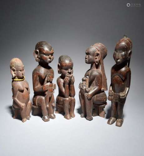 Five Kamba female figures Kenya four with infants …