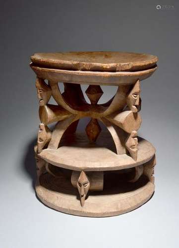 An Igbo stool Nigeria with a dished seat on diamon…