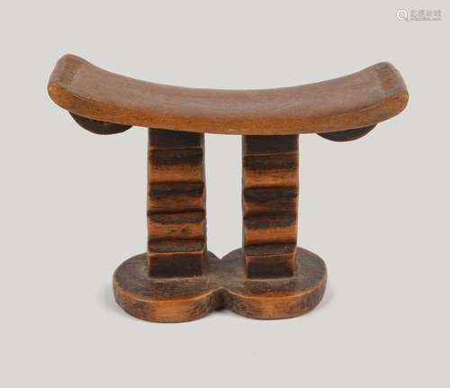 A Tsonga headrest Mozambique with crescent loops t…