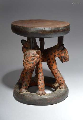 A Bamileke stool Cameroon with three carved leopar…