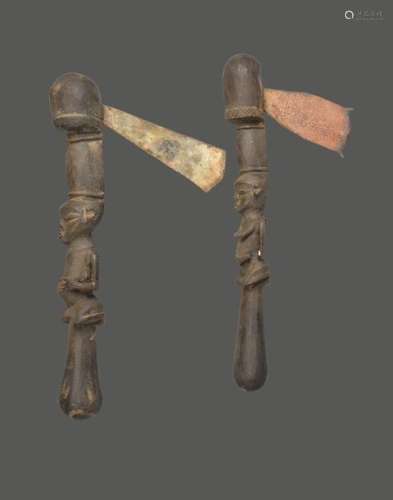 Two Yoruba ceremonial axes Nigeria with a carved k…