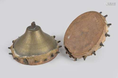 A pair of Persian falconry drums cast bronze with …