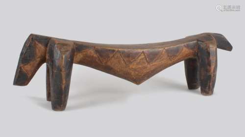 A Ngoni zoomorphic headrest Zambia with carved che…