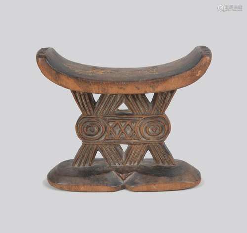 A Shona headrest Zimbabwe with carved triangles an…