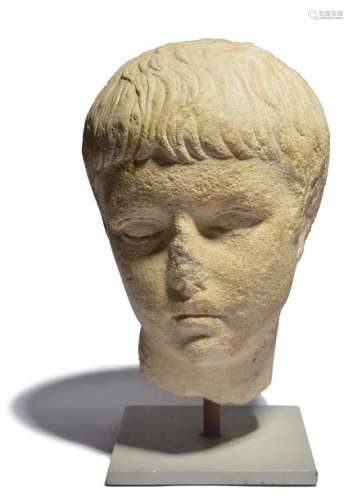 A plaster cast of a Roman head of a boy modern, 26…