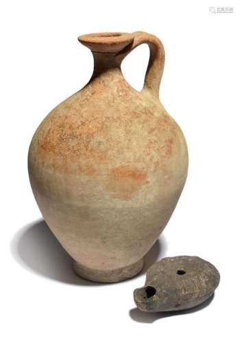 A Roman pottery jug circa 1st century AD with an o…