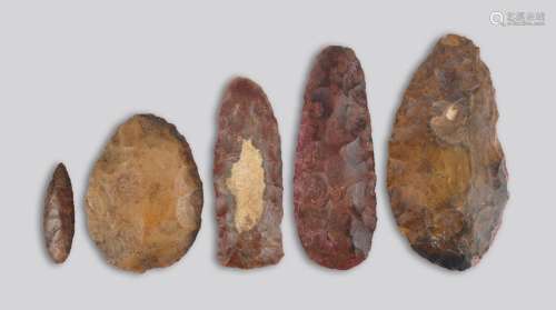 Five stone tools two with a red / pink residue, 7.…