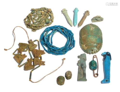 A group of Egyptian amulets and necklaces Late Per…