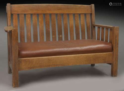 Arts & Crafts oak settee by Harden,