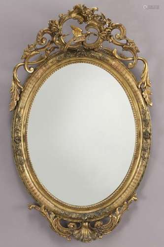 Carved gilt framed oval mirror,