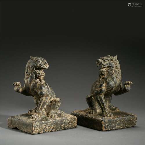 PAIR OF CHINESE BLACK STONE LION