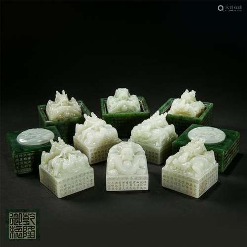 EIGHT CHINESE WHITE JADE DRAGON SEAL IN SPINACH JADE