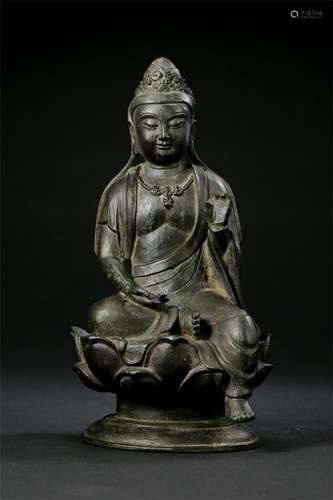 CHINESE BRONZE SEATED GUANYIN ON LOTUS STAND