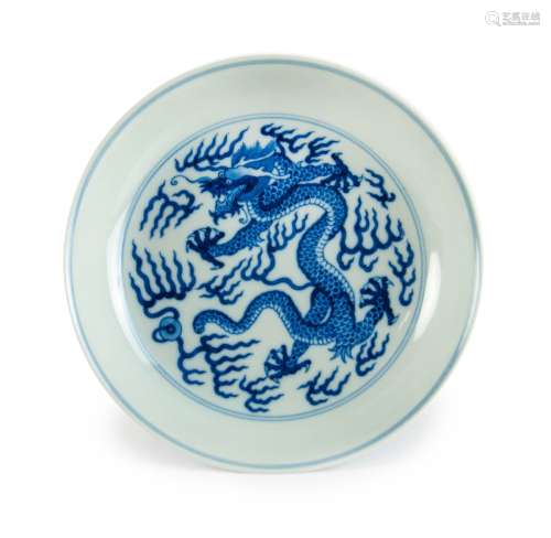 A CHINESE BLUE AND WHITE DRAGON DISH