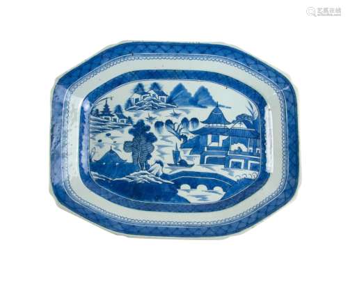 A OCTAGONAL BLUE AND WHITE VILLAGE PATTERN PLATE