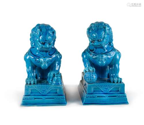 A PAIR OF CHINESE TURQUOISE-GLAZED FIGURE OF LIONS