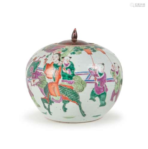 SEATED ON A QILIN DECORATED JAR