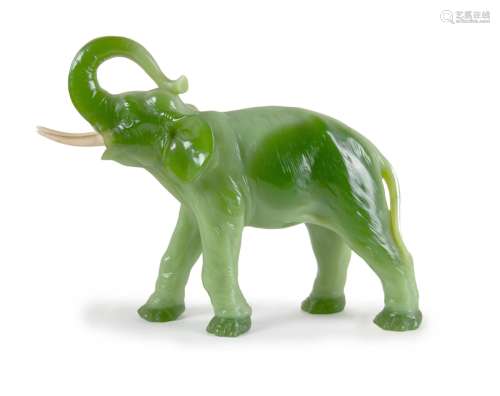 COMPOSITE CARVED GREEN ELEPHANT