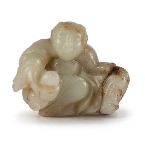 A CARVED WHITE JADE 
