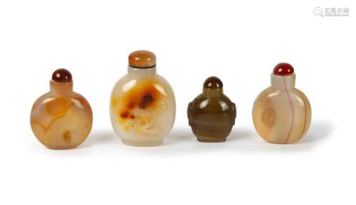 GROUP OF FOUR CARVED AGATE SNUFF BOTTLES