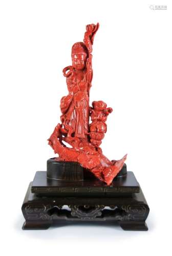 CARVED CORAL FIGURE OF GUANYIN AND BOY “CHIND-SEND