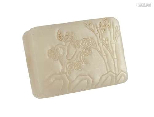 A CHINESE CARVED WHITE JADE BOX WITH COVER
