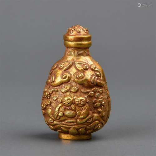 A CAREVD GOLD 'HEHE' SNUFF BOTTLE.ANTIQUE