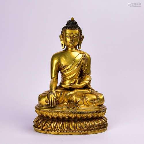 A GILT-BRONZE FIGURE OF SAKYAMUNI.MARK OF YONGLE