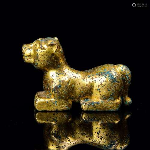 A GILT-BRONZE BEAST.ANTIQUE