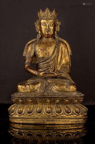 A GILT-BRONZE FIGURE OF SAKYAMUNI.ANTIQUE