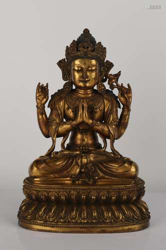 A GILT-BRONZE FIGURE OF AVALOKITESVARA.ANTIQOE