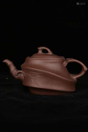 A YIXING TEAPOT AND COVER