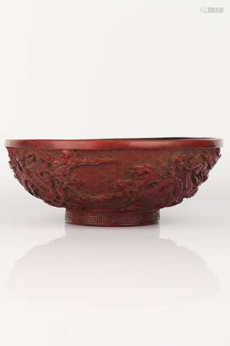 A CINNABAR LACQUER 'DRAGON' BOWL.MARK OF QIANLONG