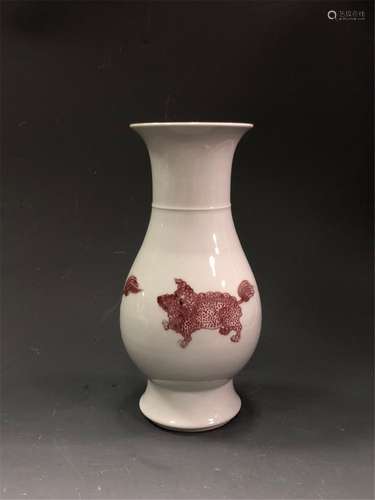 AN IRON-RED 'LION' VASE.MARK OF KANGXI