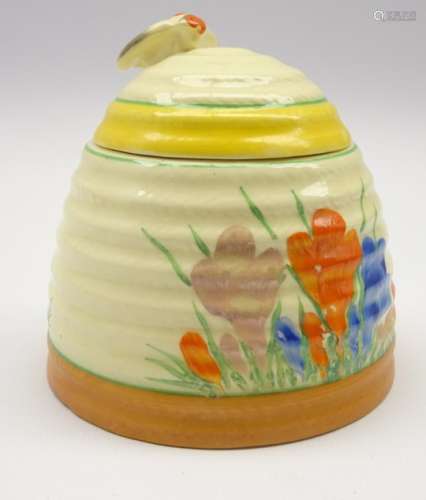 Newport pottery Clarice Cliff 'Crocus' pattern honey pot and cover in the form of a beehive and