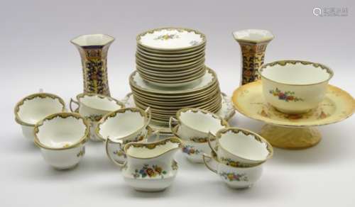 Hancocks bone china teaset decorated with floral sprays comprising 12 cups and saucers, 12 plates,