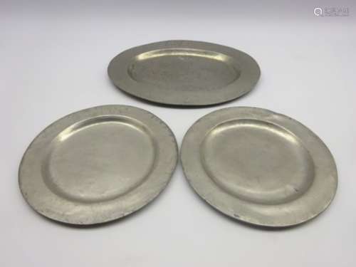 Eton College - Pair of 18th Century pewter plates D24cm and an oval platter W35cm bearing EC cypher