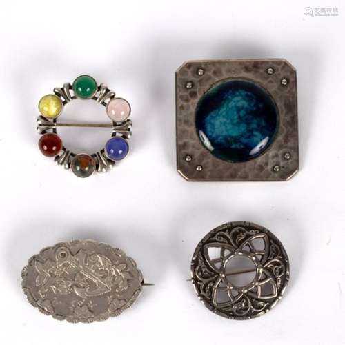 A Plantagenet pewter square brooch centered by a Ruskin type roundel in mottled blues, 4cm x 4cm,